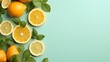 Citrus slices and mint herbs frame on retro mint pastel background with copy space from above. Top view of lemon and orange refreshment. Summer fruit smoothie minimal banner design.