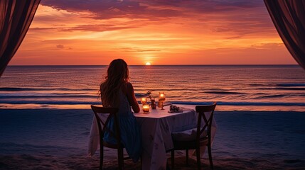 Wall Mural - romantic dinner near sea on sunset