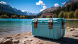 Blue cooler beside the lake, Cooler for camping outdoor.