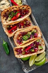 Mexican street tacos flat lay composition with lime, pepper and sauce