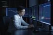 © santypan - Asian trader working in cryptocurrency