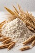 © Usman - A pile of flour next to a bunch of wheat