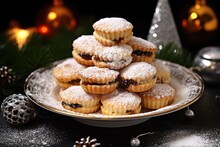 Mince Pies Stacked On Festive Serving Plate