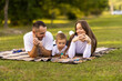 © F8  \ Suport Ukraine - Happy family with little son on summer picnic in park