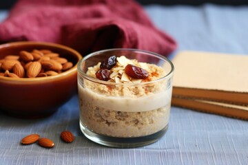 Wall Mural - oatmeal bowl next to bedtime reading glasses