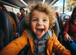 Portrait of elementary grade smiling happy cheerful child sitting in bus in safety chair seat. Means of public transport for safe travel of children and adult people.