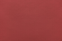 Genuine Red Leather, Eco Friendly Leatherette Texture Background. Material For Upholstery And Interior Design, Sport Items And Clothes. Wallpaper, Banner, Backdrop.