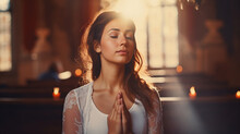 Young Woman Is Praying To God In Church. Conception Of Faith