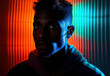 © ROC WILL - Fashion young african man black man looking at camera isolated on neon studio background, horizontal banner for website design, portrait, copy space