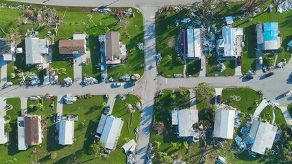 Wall Mural - Severely damaged houses after hurricane Ian in Florida mobile home residential area. Consequences of natural disaster