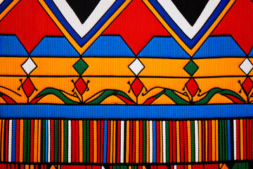 South African textile background with colorful traditional art patterns.