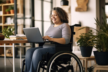 Wall Mural - Happy plus size Caucasian casual businesswoman in wheelchair using tablet in office