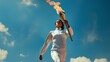 A female athlete solemnly carries the Olympic flame against the blue sky.