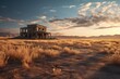 An abandoned house in the middle of the desert. This image can be used to depict isolation and solitude.