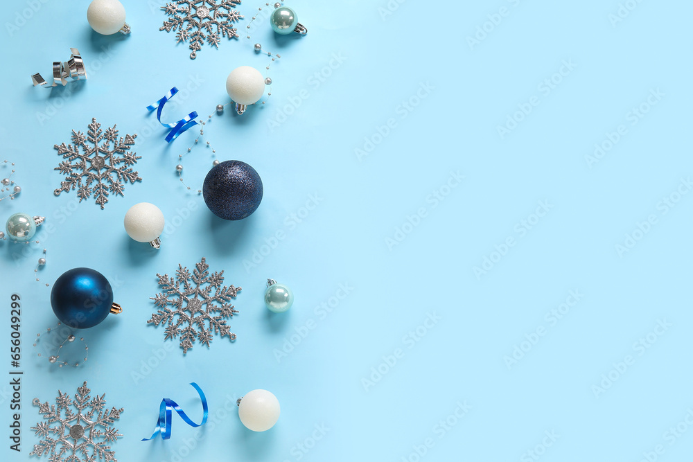 Christmas balls and snowflakes on blue background