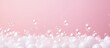 Pink pastel background with white foam bubbles perfect for laundry and cleaning services