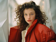 © Boadicea - Portrait of young beautiful woman in red down jacket