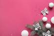 Leinwandbild Motiv Christmas tree branches with balls and bows on purple background