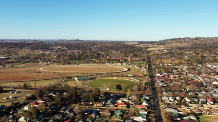 Wall Mural - Race course in Armidale town of Australia on Highlands in aerial town view 4k.
