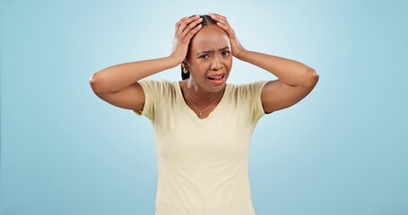 Wall Mural - Stress, panic and face of black woman in a studio with doubt, scared or angry facial expression. Anxiety, mad and portrait of young African female model with shock face isolated by blue background.