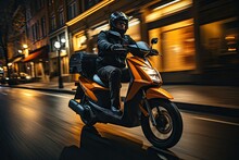 A Motorcyclist Transporting A Box On The Rear Of His Bike. Delivery Food, Take A Way Food