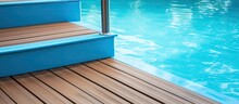 Contemporary Swimming Pool Entrance Step With Clear Blue Water On Bright Summer Day At Spa Area Teak Or Larch Board Deck