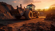 Wheel loader machine unloading rocks. Loader pours crushed stone or gravel from the bucket.