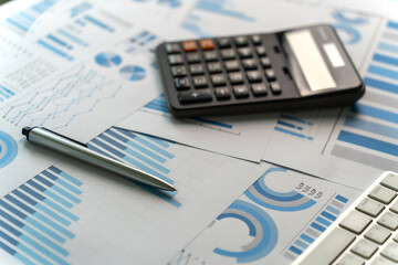 Wall Mural - Close-up of the calculator paper data report Financial chart and pen document analysis budget chart finance accounting concept