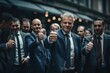 © Attasit - Group of business people giving thumbs up for support and success