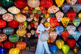 Fototapeta  - Vietnamese  paper lanterns in Hoi An ancient town. Traditional Vietnamese culture and lanterns at Hoi An ancient city Vietnam