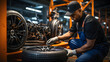 Portrait Shot of a Mechanic Working on a Vehicle in a Car Service