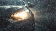Autumn Rain And Fog On The Highway Background With Burning Headlights Of An Oncoming Car Background Copy Space