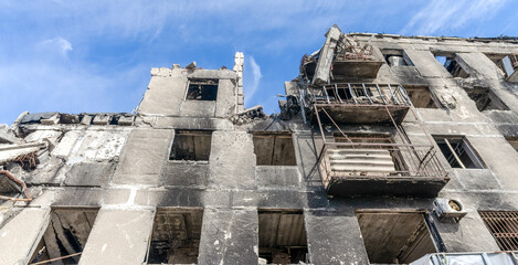 destroyed and burned houses in the city during the war in Ukraine