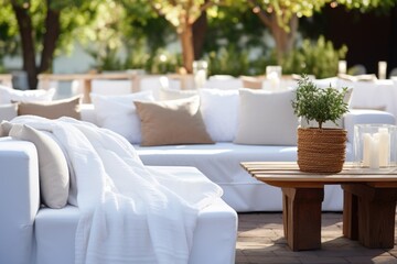 Poster - white blankets draped over outdoor seating arrangement