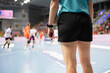 Handball woman referee with whistle