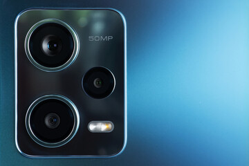 Close up of smartphone or tablet camera lens