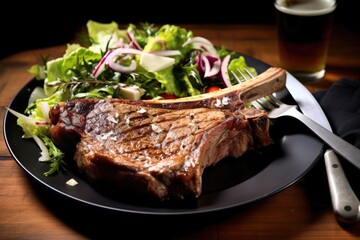 Sticker - t-bone steak with salad on a plate with a fork