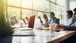 © Banana Images - Businessmen blur in the workplace or work space of table work in office with computer