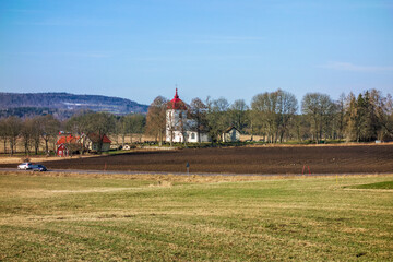 Canvas Print - Church in the countryside with a country road