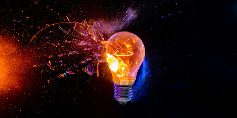Fototapete - bulb breaks and creates many fragments