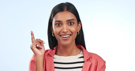 Poster - Woman, thinking and pointing in portrait with ideas, inspiration and solution on blue background in studio. Girl, planning and brainstorming creative decision, choice or problem solving a question