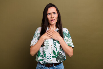 Sticker - Photo of offended confused girl with long hairstyle dressed print blouse hold hands on chest staring isolated on brown color background