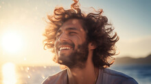 Portrait Of A Curly-haired Man Rejoicing As The Wind Tousles His Hair