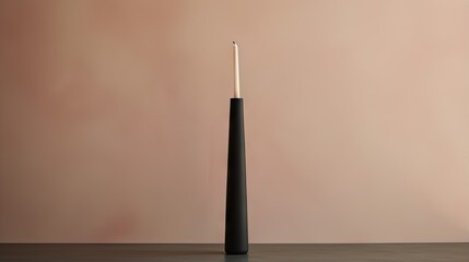 Poster -  a tall black candle with a white top on a table.  generative ai