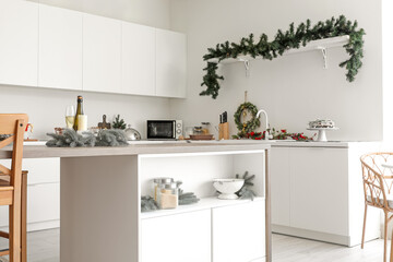 Wall Mural - Interior of light kitchen decorated for Christmas