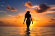 A sensual attractive young woman at a sunset beach.