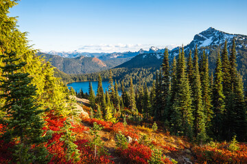 fall on the trail around naches peak in washington with a veiw of dewey lake