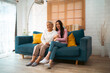 © chokniti - Enjoy happy smiling love multi-generation asian big hug family, Senior mature father and elderly mother with young adult daughter woman happy together at home, Health insurance concept, home care