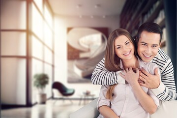 Canvas Print - Young happy couple hugging at home, AI generated image