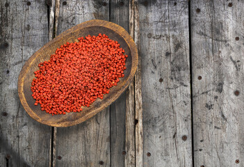 Canvas Print - Bixa Orellana - annatto organic seeds in the wooden bowl